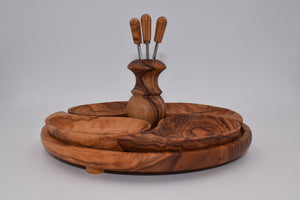 Drop-shaped appetizer set in olive wood