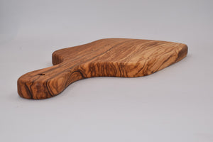 Tagliere medio irregolare con manico in legno d'ulivo