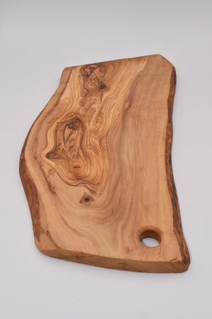 Large irregular cutting board in olive wood