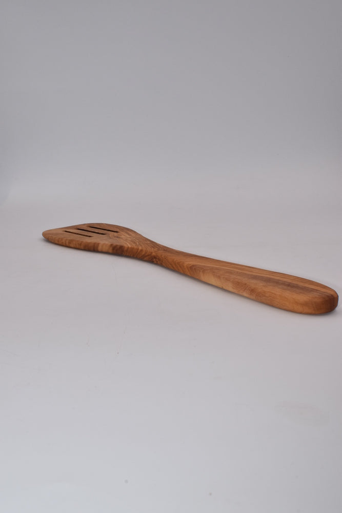 Spatola con fessure in legno d'ulivo