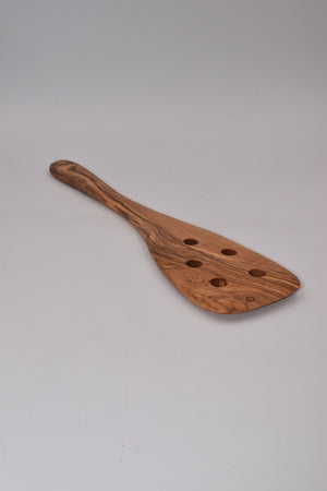 Spatula with holes in olive wood