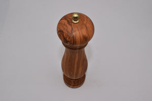 Small classic pepper mill in olive wood