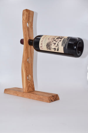 Porta bottiglia a quattro bottiglie in legno d'ulivo